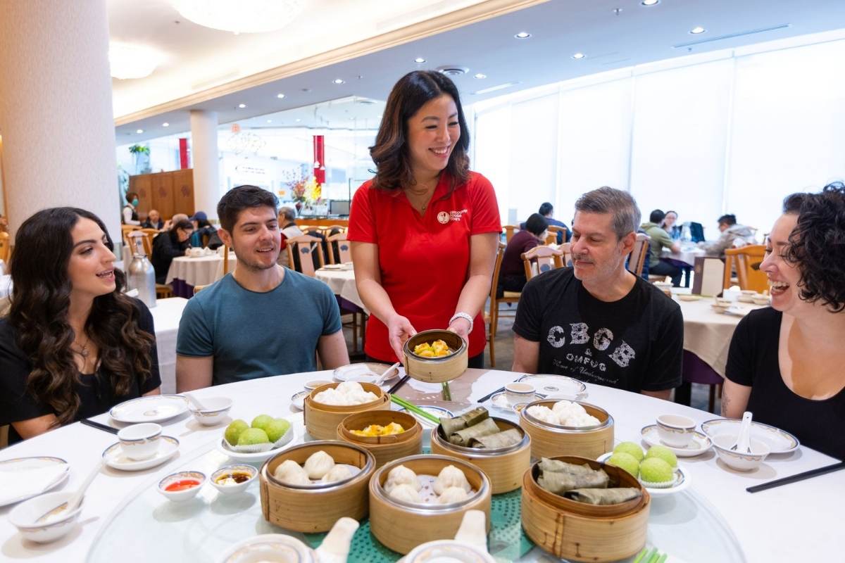 Michelle, Owner and Founder of Vancouver Foodie Tours, is serving Dim Sum at Fisherman's Terrace Seafood Restaurant. The first stop on The Authentic Asian Eats Tour.