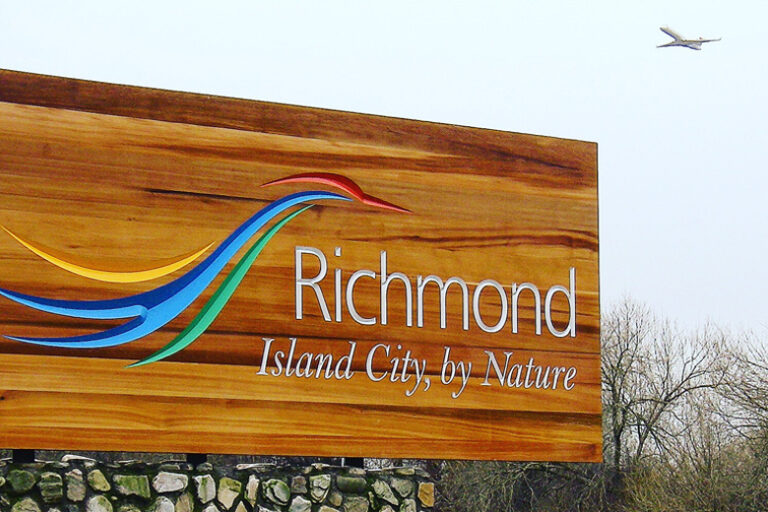 Photo of Richmond sign with subtext Island City, by Nature. Sister City of Pierrefonds, Quebec and Wakayama, Japan. Location of Vancouver Foodie Tour's Authentic Asian Eats Tour