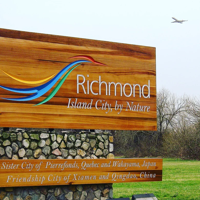 Photo of Richmond sign with subtext Island City, by Nature. Sister City of Pierrefonds, Quebec and Wakayama, Japan. Location of Vancouver Foodie Tour's Authentic Asian Eats Tour