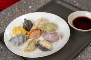 Nine dumplings served at an Authentic Asian Eats Tour