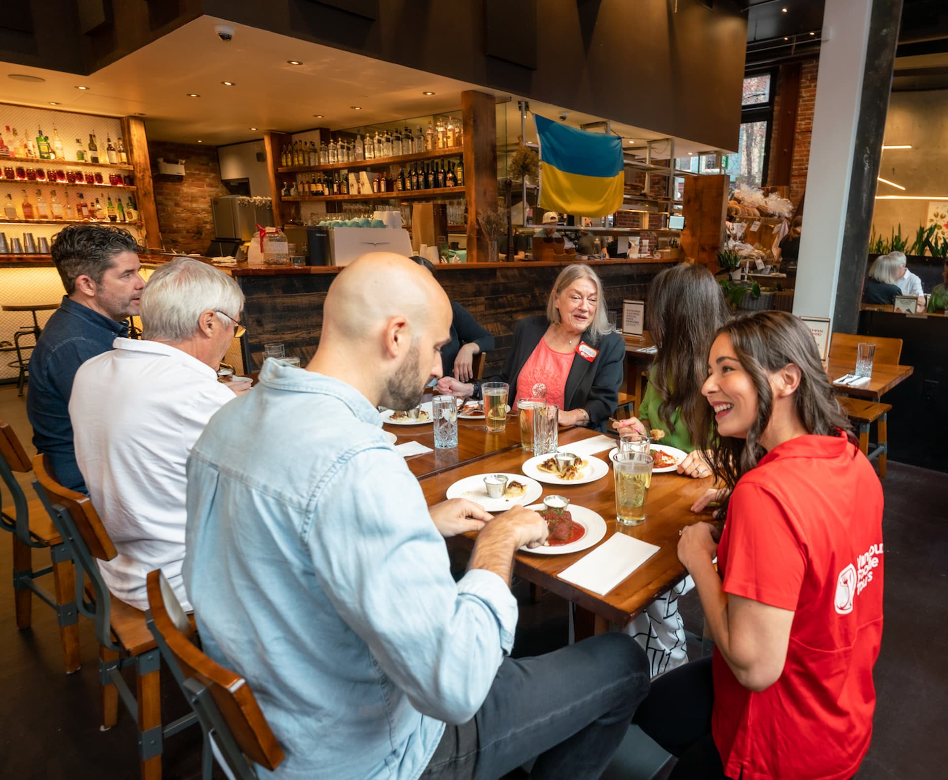 Gastronomic Gastown Tour guests enjoying their meal