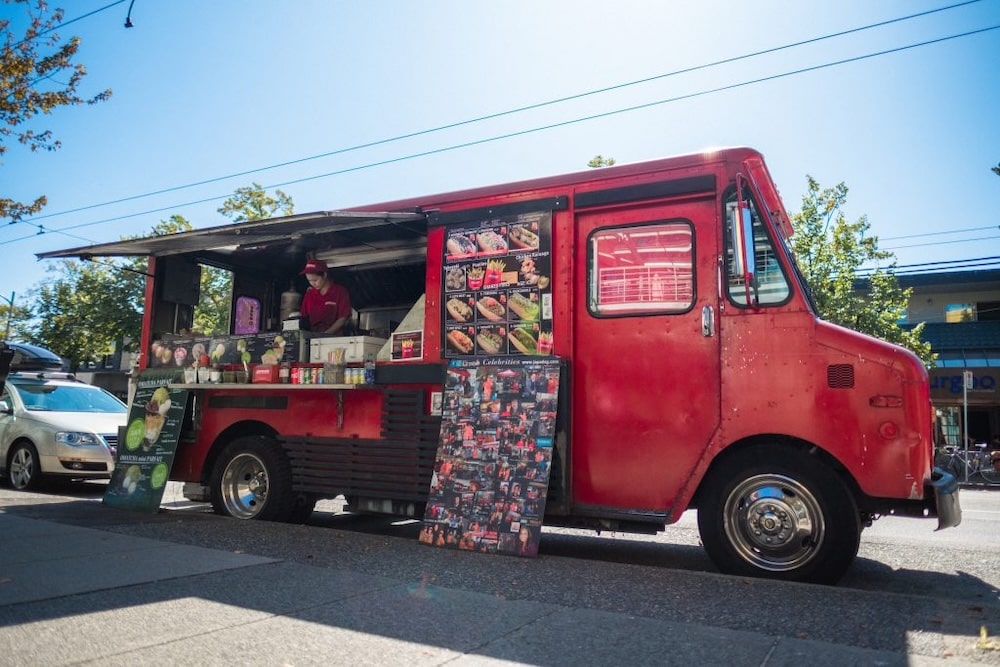 the red Japadog food truck in Vancouver ready to serve guests