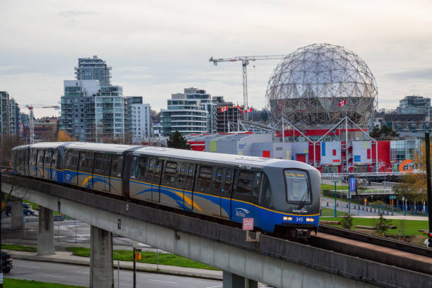 A Vancouver SkyTrain departing a station, representing connections to Granville Island via public transit.