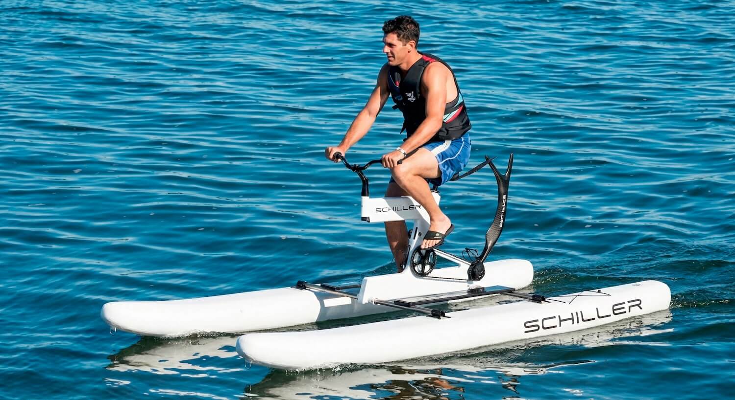 A smiling client enjoying a ride on a water bike through Vancouver with GoEasy.