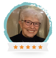 One of our happy guests, Joan Keith, smiling for a picture during a Vancouver Foodie tour.